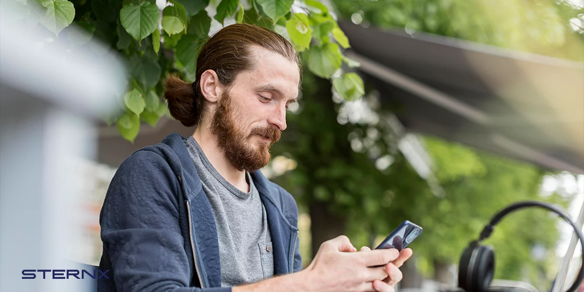 Common Myths About Digital Security. A man using public wi-fi in a cafe